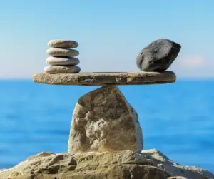 Rocks on the beach showing balance and clarity after clear mind neurofeedback.