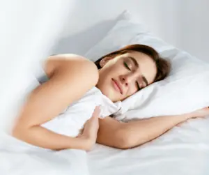 Woman lying down getting quality sleep