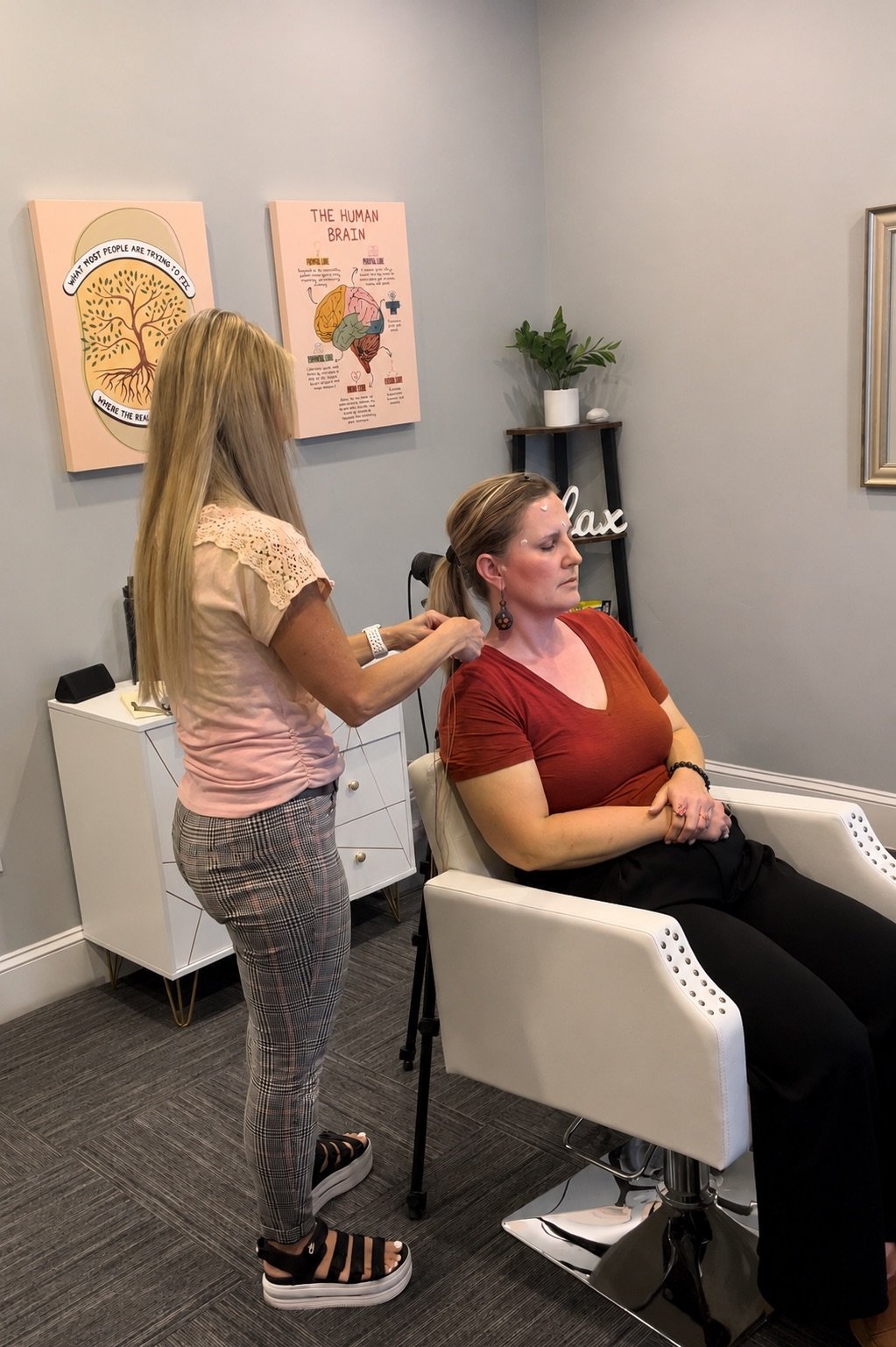 Client relaxing during an IASIS Microcurrent Neurofeedback session at Clear Mind Utah in American Fork
