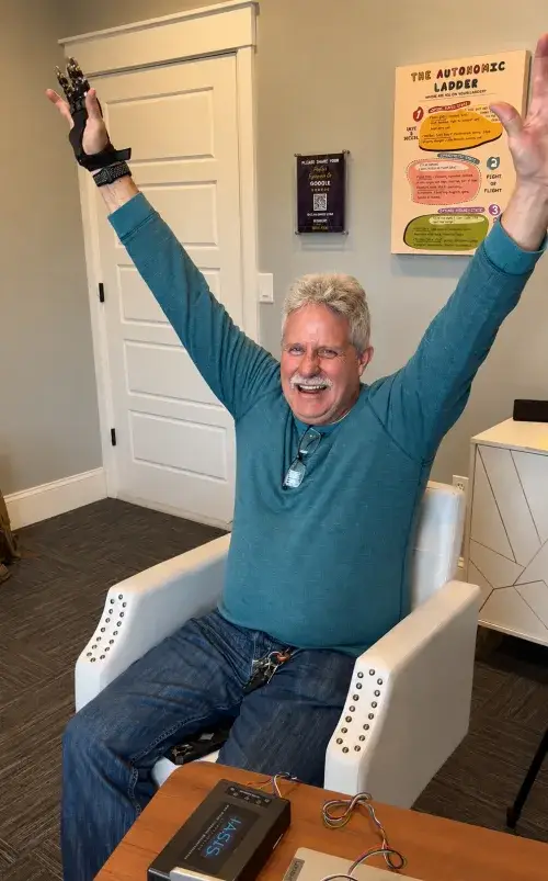 Happy client after IASIS Microcurrent Neurofeedback session at Clear Mind Utah in American Fork Utah County